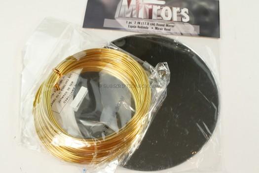 7 inch mirror and 12 gauge gold wire.