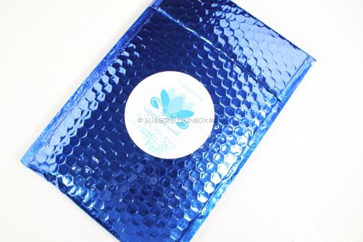 apphire blue padded envelope.