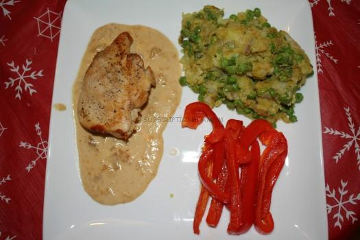 Pan-Seared Chicken and Samosa-Style Potatoes with ginger cream sauce and roasted red peppers