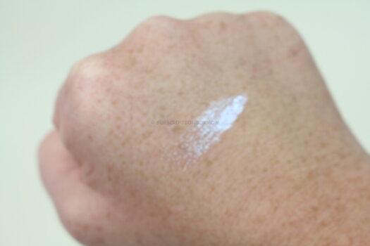 R.E.M. BEAUTY Midnight Shadows Lustrous Liquid Eyeshadow in Fembot (iridescent pink).